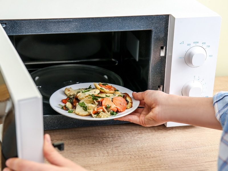Image showing foods unsuitable for microwave cooking, highlighting common issues with texture, safety, and uneven heating.